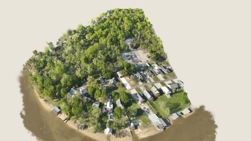 Gaussian-splat 3D model of a riverside neighborhood in the interactive viewer